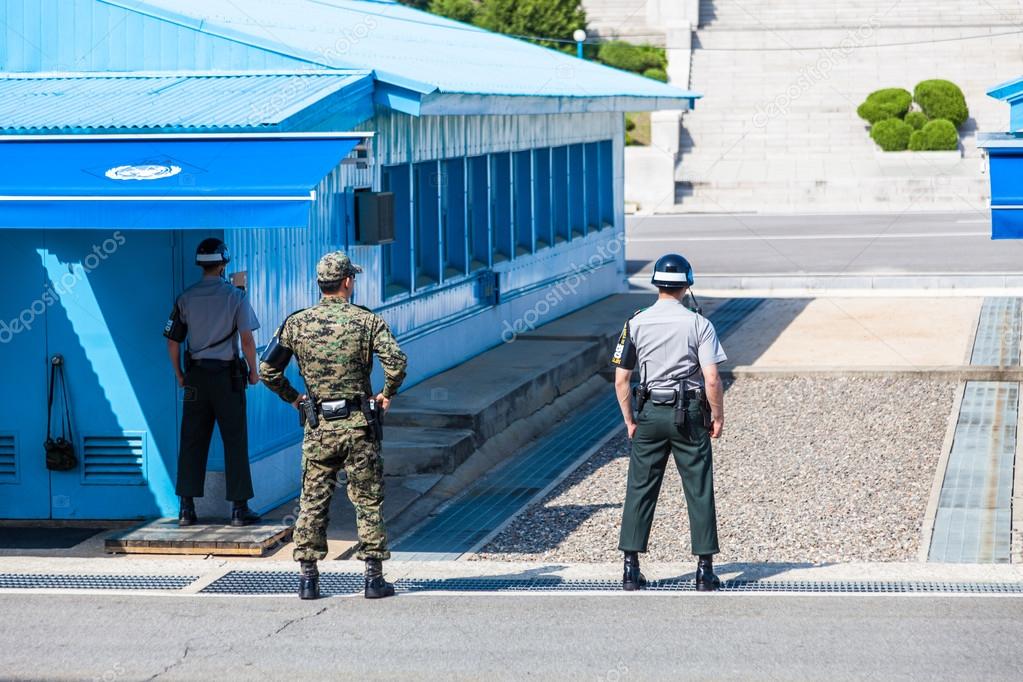 Korean soldiers watching border between South and North Korea in