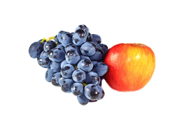 Trauben und ein Apfel — Stockfoto