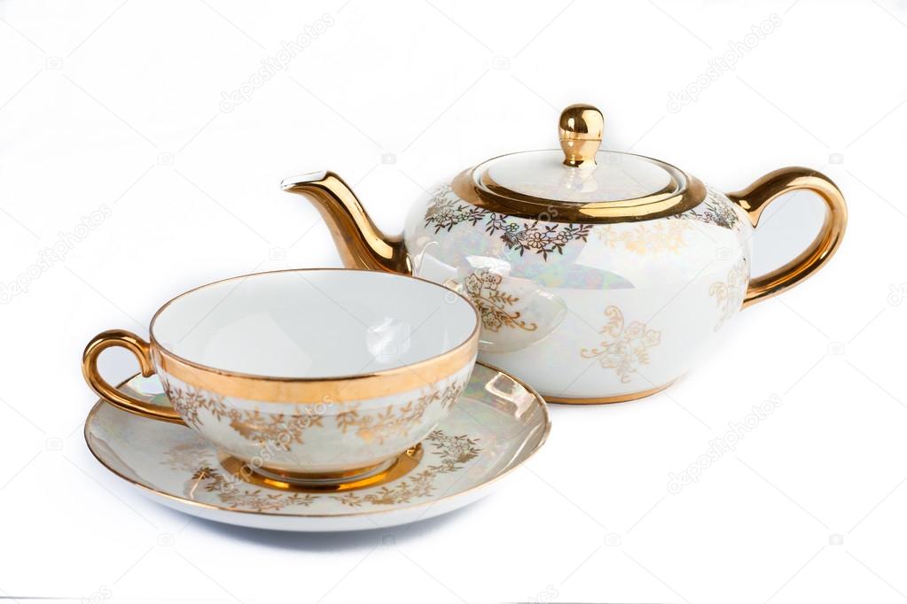 Cup and teapot from porcelain for tea