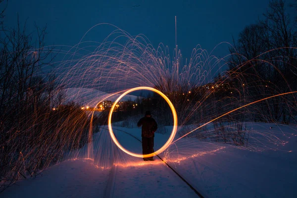 Fire painting at winter at night