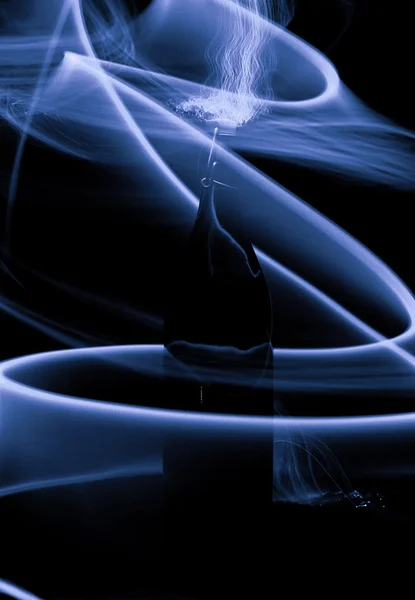 火花と光の波のガラス瓶 — ストック写真