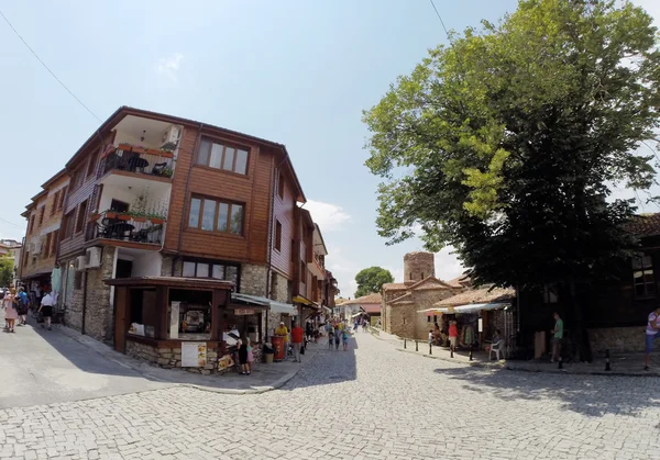 NESSEBAR, BULGARIA - JUNE 16: People visit Old Town on June 16, 2014 in Nessebar, Bulgaria. Nessebar in 1956 was declared as museum city, archaeological and architectural reservation by UNESCO. — Stock Photo, Image