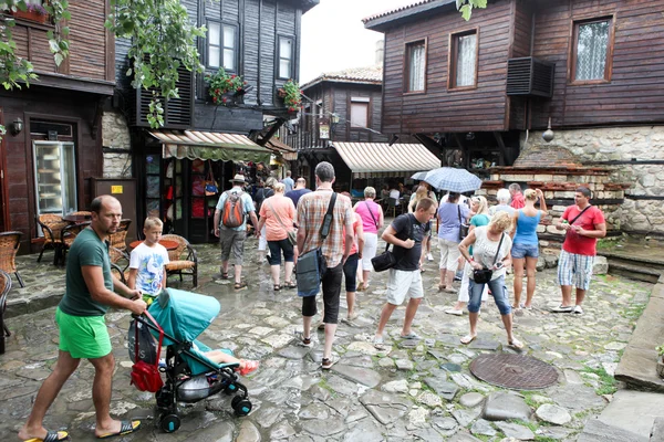 People visit Old Town on June 18, 2014 in Nessebar, Bulgaria. — Stock Photo, Image