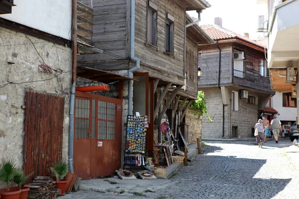 NESEBAR, BULGARIA - AUGUST 29: People visit Old Town on August 29, 2014 in Nesebar, Bulgaria. Nesebar in 1956 was declared as museum city, archaeological and architectural reservation by UNESCO. — Stock Photo, Image