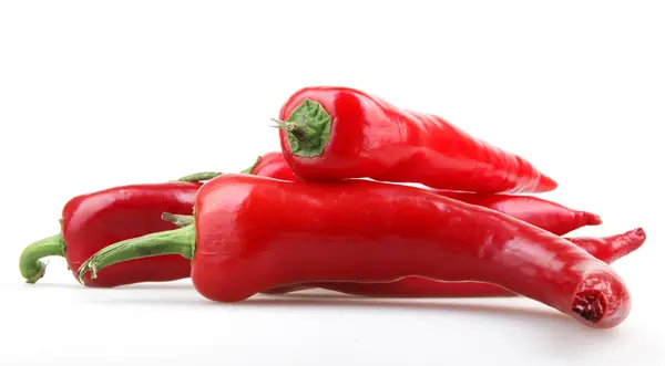 Red peppers on white background — Stock Photo, Image