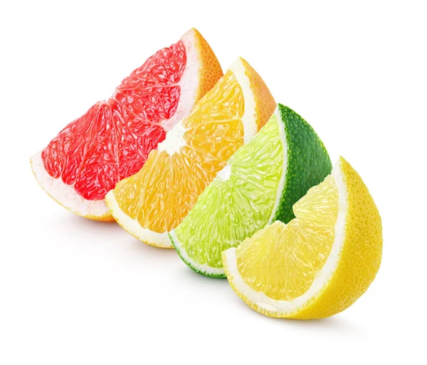 Cítricos en rodajas: lima, limón, naranja y pomelo —  Fotos de Stock