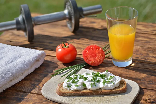 Sporty breakfast on wooden table Stock Image