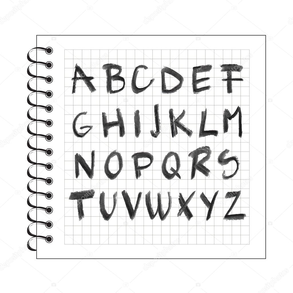 Chalck alphabet on spiral notebook paper