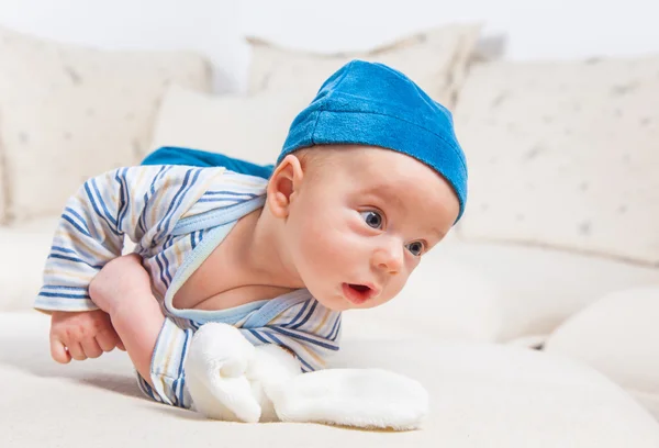 Baby boy playing with bunny — Stock Photo, Image