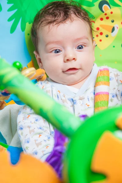 Niño en playmat — Foto de Stock