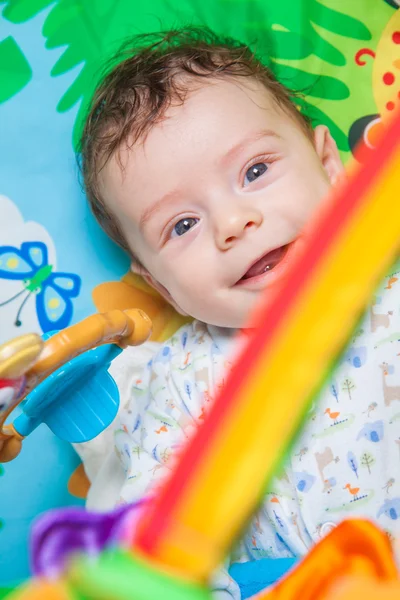 Baby boy on playmat — Stock Photo, Image
