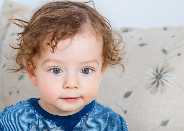 Baby boy with curly hair — Stock Photo, Image