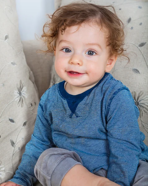 Baby boy with curly hair — Stock Photo, Image