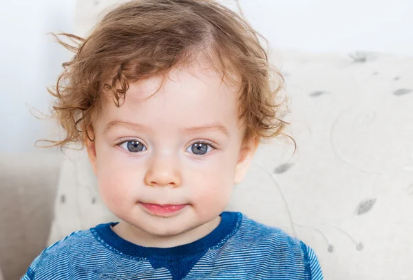 Baby boy with curly hair — Stock Photo, Image