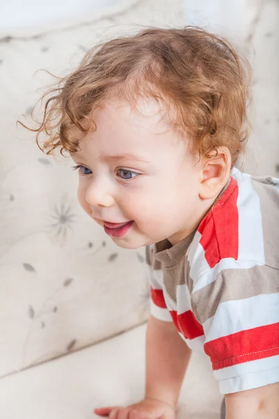 Baby boy with curly hair — Stock Photo, Image