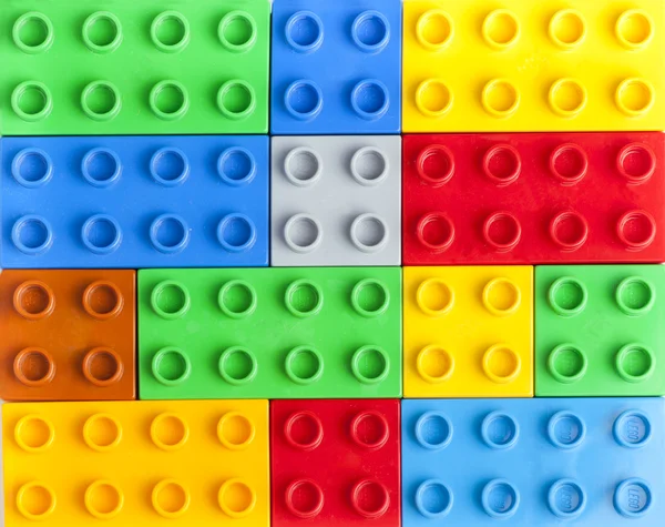 Tle kolorowe plastikowe klocki lego — Zdjęcie stockowe