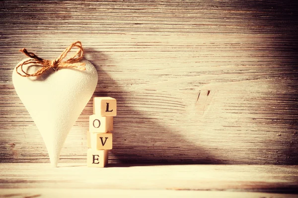 Vintage heart. Heart on a wooden background. Vintage style. — Stock Photo, Image