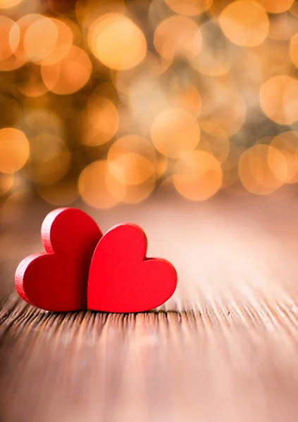 Hearts. Hearts on a wooden table and background is a bokeh. — Stock Photo, Image