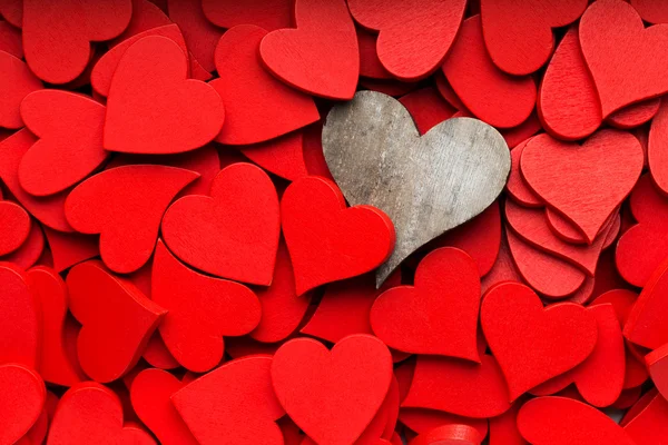 Más pequeños corazones rojos fondo. —  Fotos de Stock