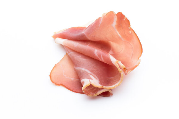 Slices of ham on white background.