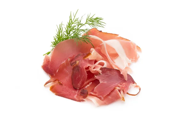 Fette di prosciutto su sfondo bianco . — Foto Stock