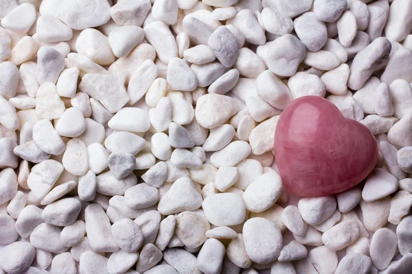 Pink heart stone on the spa stone background. — Stock Photo, Image