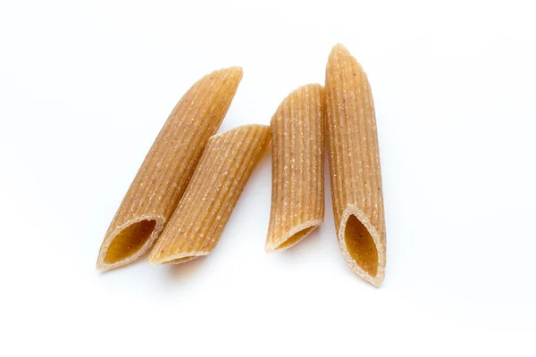 Rye flour macaroni pasta close up isolated on white. — Stock Photo, Image