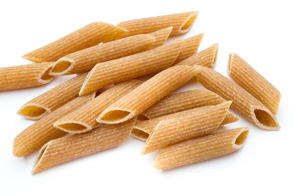 Rye flour macaroni pasta close up isolated on white. — Stock Photo, Image