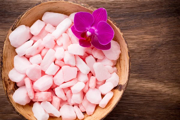 Sea salt with orchid flower. — Stock Photo, Image