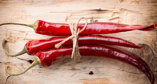 Spice. Spice mix a wooden spoon on a wooden background. — Stock Photo, Image