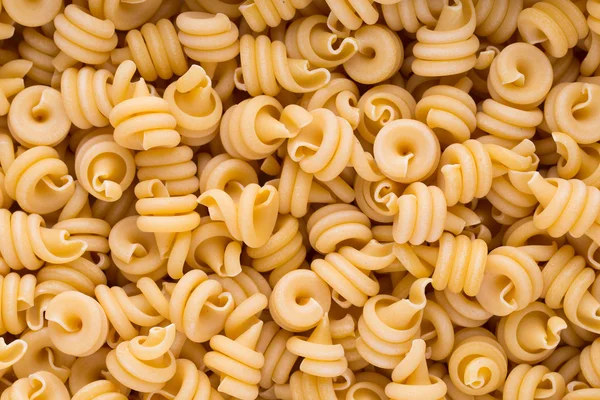 Macarrones italianos pasta fondo completo. — Foto de Stock