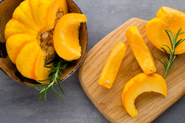 Pumpkin. Pupkin slices on the gray background. — Stock Photo, Image