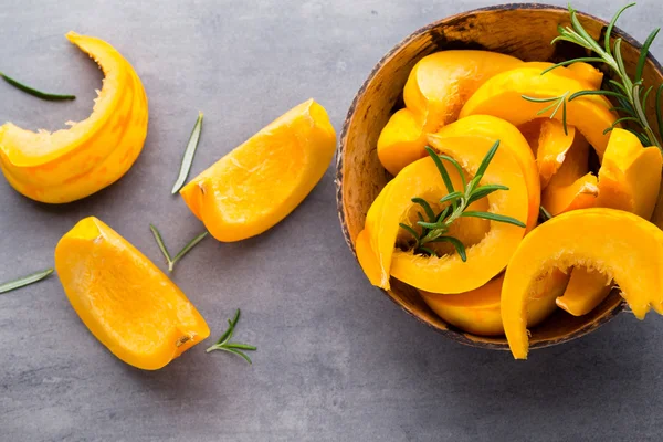 Pumpkin. Pupkin slices on the gray background. — Stock Photo, Image