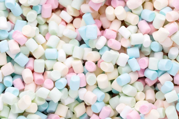 Bakgrund eller konsistens av färgglada mini marshmallows. — Stockfoto