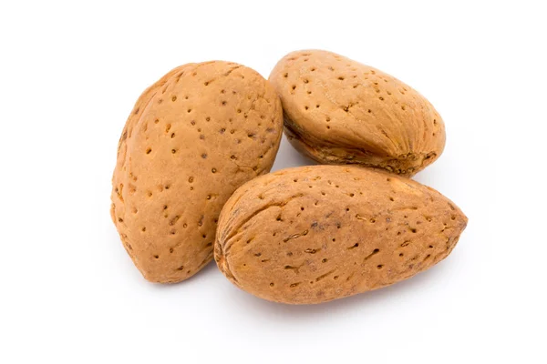 Group of almond nuts. Isolated on a white background. — Stock Photo, Image