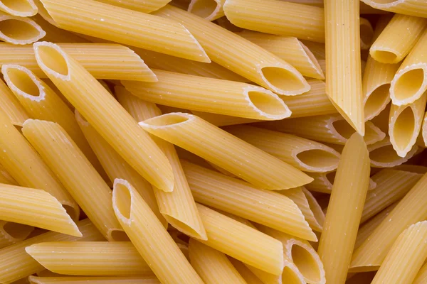 Italian macaroni pasta full background. — Stock Photo, Image