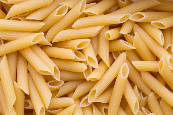 Italian macaroni pasta full background. — Stock Photo, Image