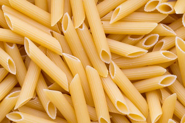 Italian macaroni pasta full background. — Stock Photo, Image