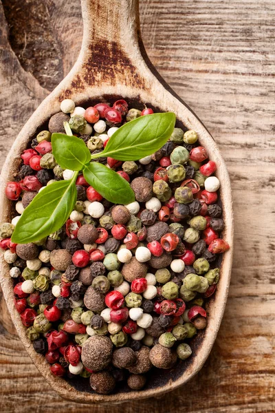 Spice. Spice mix a wooden spoon on a wooden background. — Stock Photo, Image