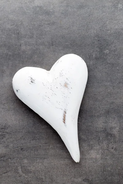 White heart on the gray metal background. — Stock Photo, Image