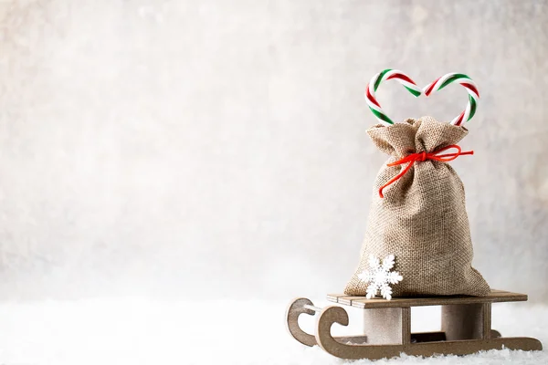 Christmas gard. Gift bag with burlap. Christmas decoration. — Stock Photo, Image