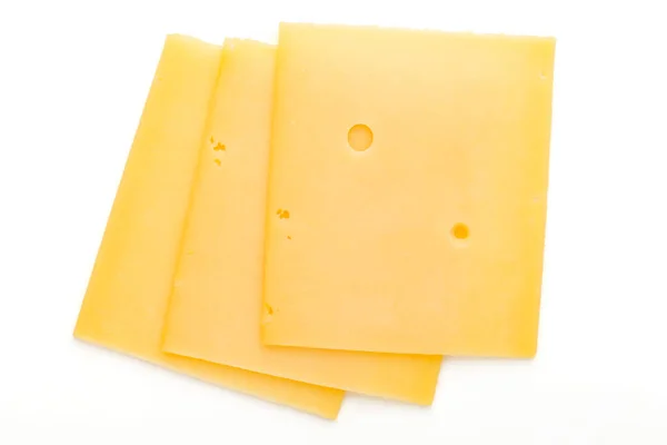 白い背景に隔離されたチーズスライス — ストック写真