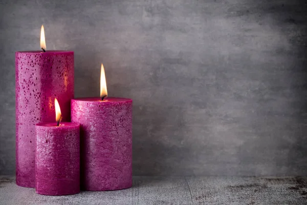 Three Purple Candles Gray Background Christmas Decoration Advent Mood — Stock Photo, Image