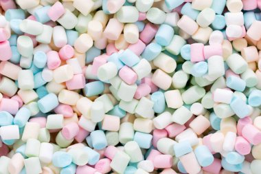 Şekerlemeler. Renkli mini marşmelovların arkaplan ya da dokusu.