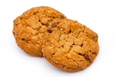 İzole edilmiş arkaplanı olan yulaf ezmeli kurabiyeler.