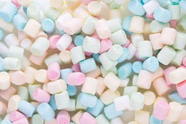 Şekerlemeler. Renkli mini marşmelovların arkaplan ya da dokusu.