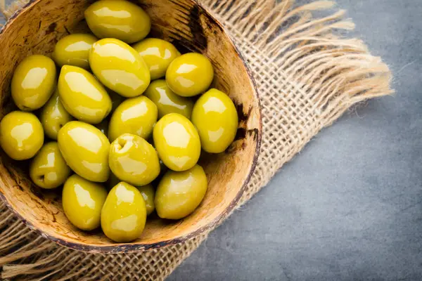 Fresh Olives Gray Background Olives Bowl Spoon — Stock Photo, Image