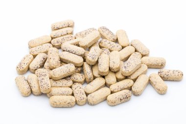 Vitamin kapsülleri, alternatif tıp homeopatik takviyesi.