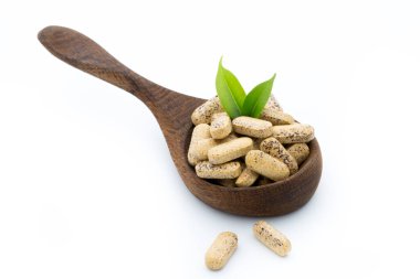 Vitamin kapsülleri, alternatif tıp homeopatik takviyesi.