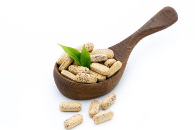 Vitamin kapsülleri, alternatif tıp homeopatik takviyesi.